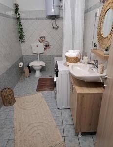 a bathroom with a sink and a toilet at Stelina's Guest House in Trikala in Tríkala +36 photos