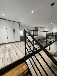 Katil atau katil-katil dalam bilik di Isla Apartment