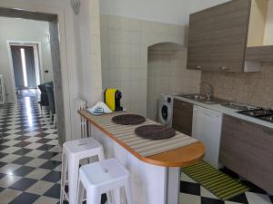 Kuchyň nebo kuchyňský kout v ubytování La Casa a Corte