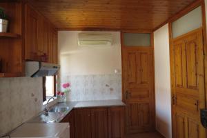 Kuchyň nebo kuchyňský kout v ubytování Mystras Inn