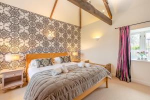 a bedroom with a large bed in a room at 3 Bed in nr Beadnell oc-cr1279 in Beadnell