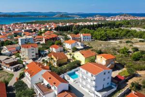 an aerial view of a town with orange roofs at Infinity Appartements in Vodice - Nord-Dalmatien in Vodice