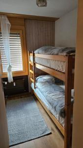 Postel nebo postele na pokoji v ubytování Schöne Ferienwohnung Nr.26 im Haus Opal