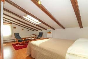 Postel nebo postele na pokoji v ubytování Eva in Poreč * Istrien