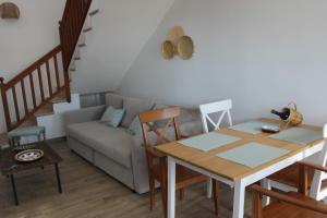 a living room with a couch and a table at Casa Antonio-Tinajo in Tinajo