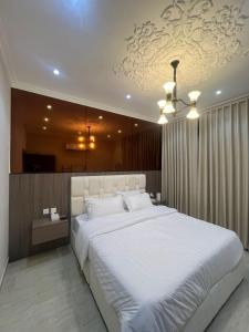 Postel nebo postele na pokoji v ubytování Living House, North Rakah, Al Khobar