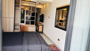 Η κουζίνα ή μικρή κουζίνα στο UN approved snug studio with gym