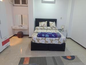 Ένα ή περισσότερα κρεβάτια σε δωμάτιο στο Sweet Home- Last Check in 12 Am