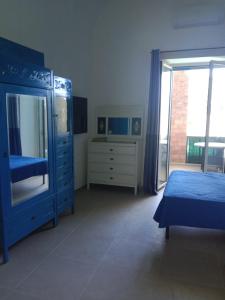 Ένα ή περισσότερα κρεβάτια σε δωμάτιο στο CasaStazionePicanello +20 φωτογραφίες