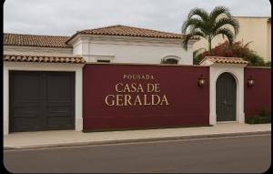 a sign that reads pasadena casa de granada in front of a building at Pousada Casa de Geralda in Altaneira