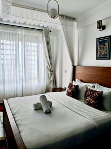 Ένα ή περισσότερα κρεβάτια σε δωμάτιο στο Bomani -4 Summerlake