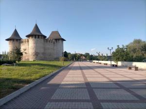 an empty street in front of a castle at Apartament Soroca in Soroca