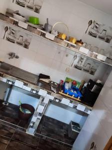 an overhead view of a kitchen with a counter top at Grand Studio avec toutes les commodités in Dakar +10 photos