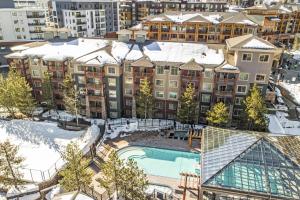 an aerial view of a resort in the snow with a pool at Westgate Charm #4814B in Park City