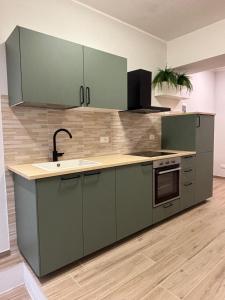 Kuchyň nebo kuchyňský kout v ubytování S&G Maison Le Piagge + 14 fotografií