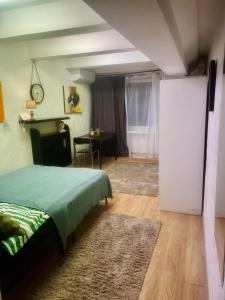 Ένα ή περισσότερα κρεβάτια σε δωμάτιο στο Studio 10 min walk from old town