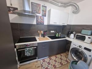 Dapur atau dapur kecil di Weser Apartment