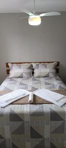 Ένα ή περισσότερα κρεβάτια σε δωμάτιο στο Apê só pra você no Rio Centro e Parque Olímpico - Barra RJ