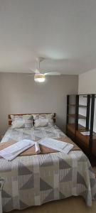 Ένα ή περισσότερα κρεβάτια σε δωμάτιο στο Apê só pra você no Rio Centro e Parque Olímpico - Barra RJ