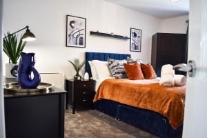Ένα ή περισσότερα κρεβάτια σε δωμάτιο στο Stylish Flat Near Coop Arena & Etihad Stadium +7 φωτογραφίες