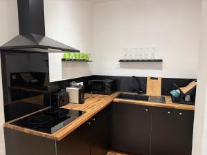 ครัวหรือมุมครัวของ Bel appartement au centre ville de Carpentras +14 ภาพ