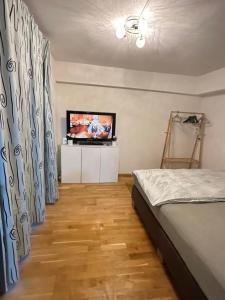 Postel nebo postele na pokoji v ubytování Stilvolle 2-Zimmer-Wohnung in zentraler Lage