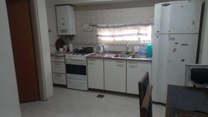 Η κουζίνα ή μικρή κουζίνα στο Departamento barrio sur