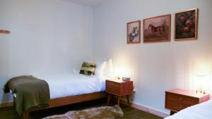 Postel nebo postele na pokoji v ubytování Lay Back Lodge