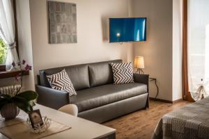 Posezení v ubytování Le Servite Apartments