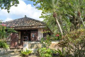 Vườn quanh 車で市街地近くの静かな田舎空間一沖縄古民家の宿 +13 ảnh