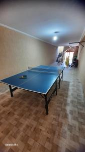 a ping pong table in the middle of a room at ZL Brasil in São Paulo