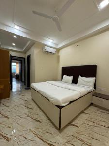 Ένα ή περισσότερα κρεβάτια σε δωμάτιο στο Hotel Udai Garh Palace