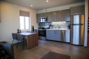 Kuchyň nebo kuchyňský kout v ubytování Love to Smile Apartments - Apt 3 + 12 fotografií