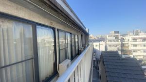 Balkón nebo terasa v ubytování World Friendship Center Guesthouse + 9 fotografií