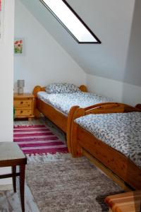Un pat sau paturi într-o cameră la Villa Negra vendégház
