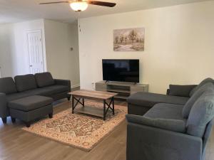 Posezení v ubytování Peaceful & Spacious Family Home