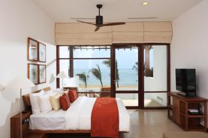 Letto o letti in una camera di Anantaya Resort & Spa Chilaw