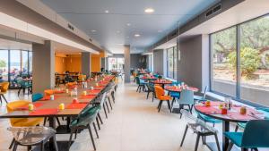 Um restaurante ou outro lugar para comer em Pharos Hvar Bayhill Hotel