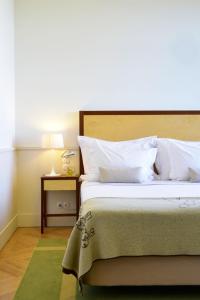 Cama ou camas em um quarto em Pousada da Serra da Estrela