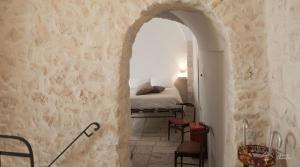 Albergo Diffuso Sotto le Cummerse客房内的一张或多张床位