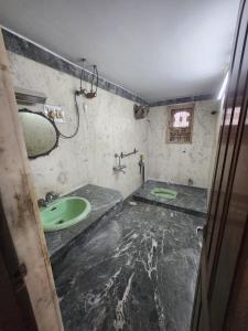 Ένα μπάνιο στο ExploreInAsia Service Apartments