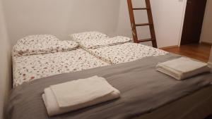 Posteľ alebo postele v izbe v ubytovaní Spa Apartamenty Lidzbark