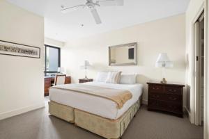 Ένα ή περισσότερα κρεβάτια σε δωμάτιο στο Waterfront Executive Apartment in central Geelong