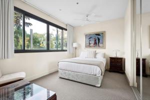 Ένα ή περισσότερα κρεβάτια σε δωμάτιο στο Waterfront Executive Apartment in central Geelong