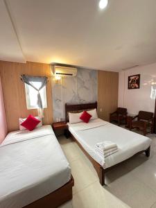 Ένα ή περισσότερα κρεβάτια σε δωμάτιο στο Valentine Hotel - Bui Vien Street