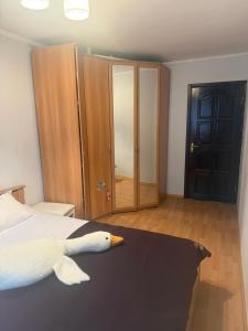 Ένα ή περισσότερα κρεβάτια σε δωμάτιο στο Goslings apartment