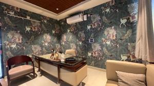 Χώρος καθιστικού στο Hotel GMR Pearls