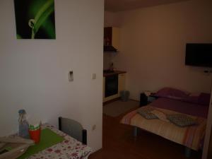 Postel nebo postele na pokoji v ubytování Apartment Luna