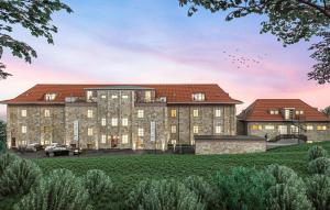 eine architektonische Darstellung eines großen Steingebäudes mit einem roten Dach in der Unterkunft Apartment Imenau in Bad Frankenhausen