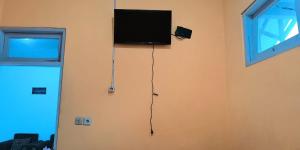 Μια τηλεόραση ή/και κέντρο ψυχαγωγίας στο Green House Homestay